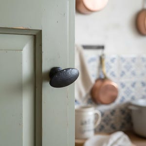 Set of 2 black vintage oval door knobs, French farmhouse interior hardware - kitchen cabinet pulls