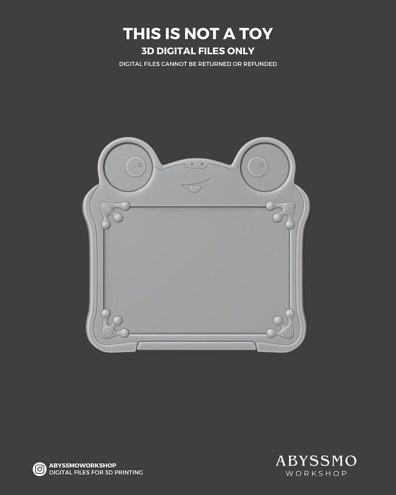 Puede incluir: Un dise&ntilde;o de archivo digital 3D gris con forma de rana. El dise&ntilde;o presenta un centro rectangular con esquinas redondeadas y elementos decorativos. El texto "THIS IS NOT A TOY" y "3D DIGITAL FILES ONLY" se muestra arriba. El logotipo de Abyssmo Workshop est&aacute; en la parte inferior.
