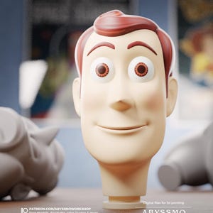 Puede incluir: Modelo impreso en 3D de una cabeza de personaje de dibujos animados, con piel clara, cabello rojo y ojos grandes y expresivos. El modelo tiene una expresión sonriente. La imagen incluye texto: "ABYSSMO WORKSHOP" y "Archivos digitales para impresión 3D."