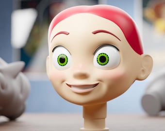 Op de afbeelding: Een 3D-geprint hoofd met een glimlachende uitdrukking, groene ogen en rood haar. Het hoofd heeft een lichte huidskleur met roze wangen. De afbeelding bevat de tekst "Digital files for 3d printing" en "ABYSSMO WORKSHOP".