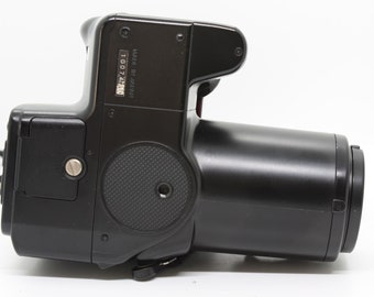 Olympus IS2 DLX(3) Olympus IS2-DLX ou IS2000 Objectiva zoo