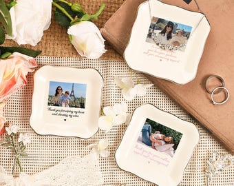 May include: A set of three ceramic mugs with a speckled, matte finish. The mugs are in shades of cream, light gray, and dark gray. Each mug has a simple, minimalist design, perfect for coffee or tea.