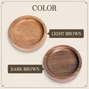 May include: Two circular wooden coasters with a recessed center. One coaster is light brown with a visible wood grain, and the other is dark brown with a smooth finish. The image includes the text COLOR, LIGHT BROWN, and DARK BROWN.