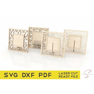 May include: Four laser-cut wooden square frames with intricate decorative designs. The frames have a central opening and a slot for holding a card or photo. The image includes the text "SVG DXF PDF" and "LASER CUT READY FILE".