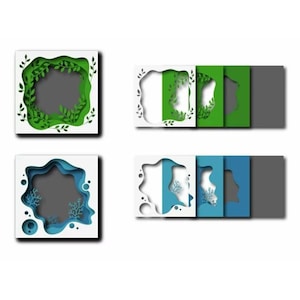 Peut inclure: Quatre cadres carr&eacute;s blancs avec des motifs d&eacute;coup&eacute;s diff&eacute;rents. Le cadre en haut &agrave; gauche a un motif de feuilles vertes. Le cadre en haut &agrave; droite a un motif de feuilles vertes sur fond blanc. Le cadre en bas &agrave; gauche a un motif ondul&eacute; bleu. Le cadre en bas &agrave; droite a un motif ondul&eacute; bleu sur fond blanc.