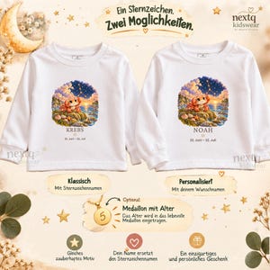 Puede incluir: Dos camisetas blancas de manga larga con un gr&aacute;fico de un cangrejo en una costa rocosa bajo un cielo estrellado. Una camiseta muestra el texto KREBS y la otra NOAH, ambas con las fechas 22. Juni - 22. Juli. Incluye un medall&oacute;n dorado opcional.