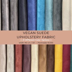 May include: A collection of vegan suede upholstery fabric swatches in various colors, including gray, blue, and beige. The image displays 21 different color options. The fabric width is 55 inches.
