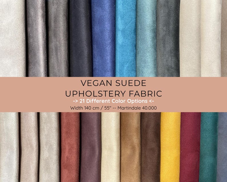 May include: A collection of vegan suede upholstery fabric swatches in various colors, including gray, blue, and beige. The image displays 21 different color options. The fabric width is 55 inches.