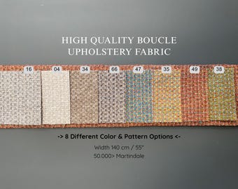 May include: A selection of eight bouclé upholstery fabric swatches in diverse colours, including grey, beige, brown, and teal. The text reads "HIGH QUALITY BOUCLE UPHOLSTERY FABRIC" and "8 Different Color & Pattern Options". The width is 140 cm.