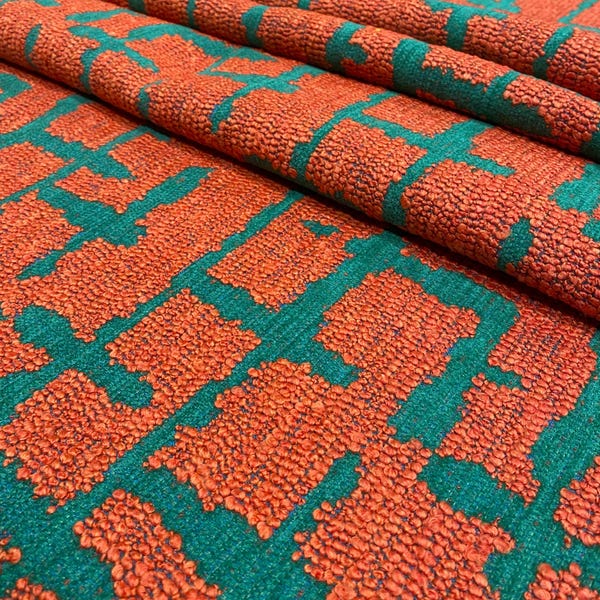 Tissu d'ameublement bouclé géométrique orange sarcelle pour canapé, fauteuil et banc par mètre, Bohème