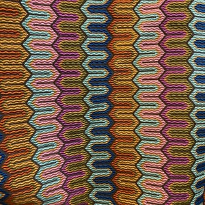 May include: Close-up of a colorful textile with a repeating geometric pattern. The design features a series of interconnected, wavy lines within hexagonal shapes. Colors include shades of blue, orange, pink, and purple, creating a vibrant and textured appearance.