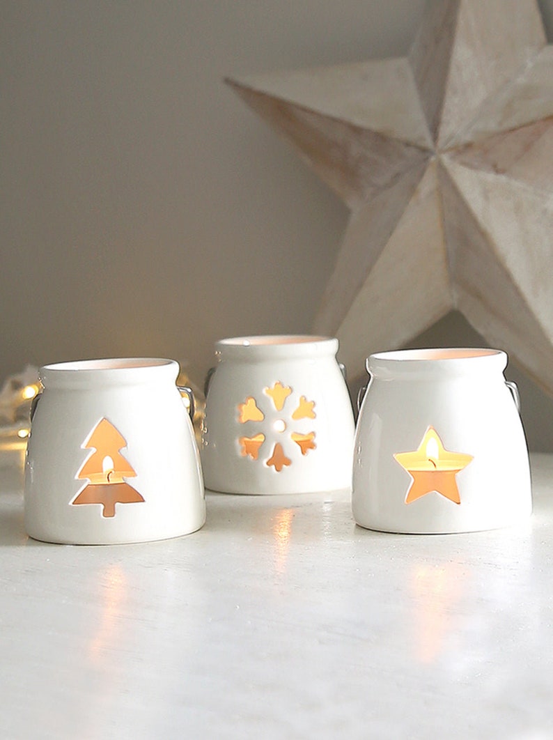 Vela navideña de porcelana blanca