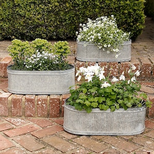 Jardinera ovalada acanalada