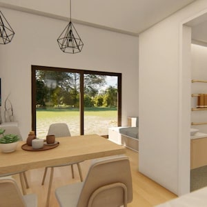 May include: Interior view of a modern dining area with a wooden table and chairs. Geometric pendant lights hang above the table. A large window offers a view of the outdoors. The room is painted in neutral colors.