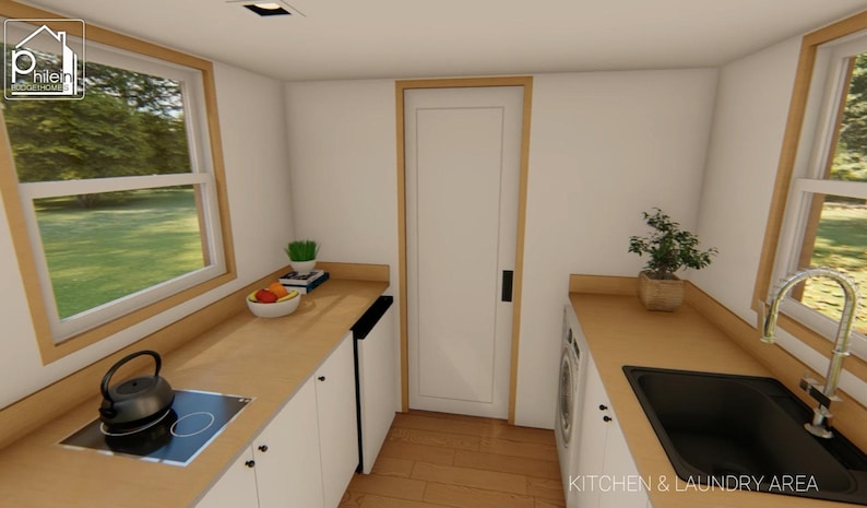May include: Interior view of a kitchen and laundry area with white cabinets, light wood countertops, and a black sink. A black stovetop and a kettle are visible. The room has a window and a door. The text "KITCHEN & LAUNDRY AREA" is at the bottom.