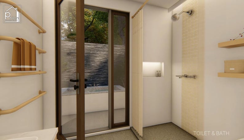 May include: A modern bathroom interior with a shower, wooden towel racks, and a large glass door leading to an outdoor area. The walls are white, and the shower area has a light-colored tile design. A brown towel hangs on the rack.