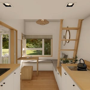 May include: Interior view of a tiny house kitchen with light wood cabinets and countertops. A black sink and stovetop are visible. A wooden ladder leads to a loft area. A window provides a view of the outdoors.