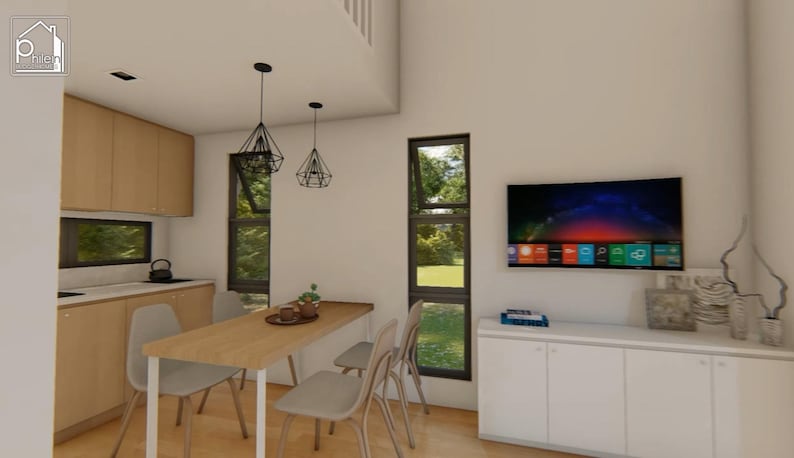 May include: Interior shot of a modern dining area with a wooden table and chairs. Two geometric pendant lights hang above the table. A large flat-screen TV is mounted on the wall. The kitchen features light wood cabinets.