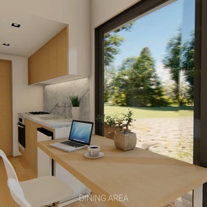 cute kitchen with small dining area
