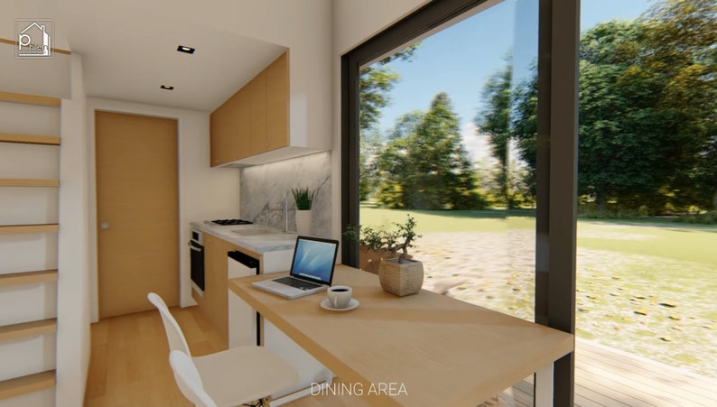 cute kitchen with small dining area