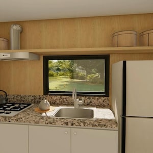 May include: A kitchen interior with light-colored cabinets, a granite countertop, and a stainless steel sink. A gas stove, range hood, and refrigerator are visible. Two decorative containers sit on a shelf above the sink. The word "KITCHEN" is written on the bottom right.