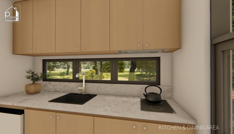 May include: A modern kitchen design featuring light wood cabinetry and a marble countertop. A black sink and stovetop are visible, along with a black kettle. A window offers a view of trees. The text "KITCHEN & DINING AREA" is at the bottom.