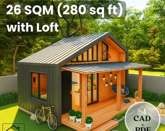 Könnte beinhalten: Ein kleines Holzhaus mit einem Loft, mit dunkelgrauer Außenfassade und einer hellen Holzveranda. Das Bild enthält den Text "26 m² (260 sq ft) mit Loft". Ein gelbes Fahrrad steht in der Nähe. Das Haus hat ein Metalldach und ist von Grün umgeben.