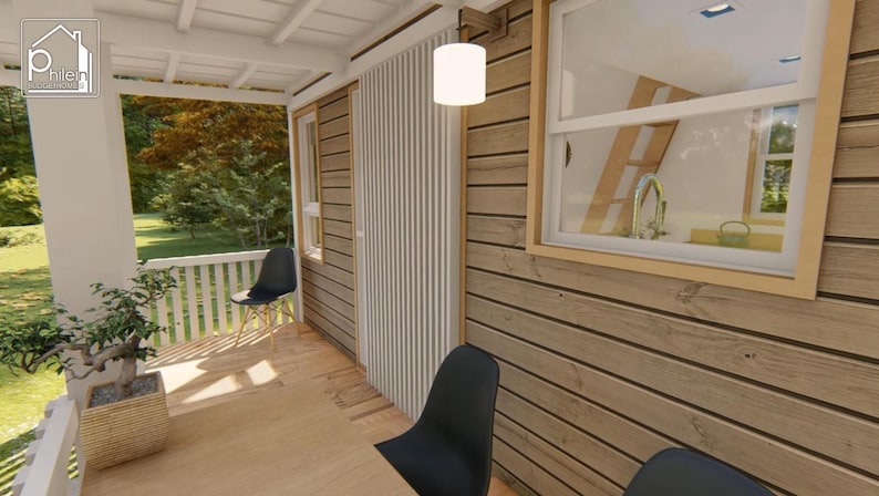May include: Exterior view of a small cabin with a porch. The cabin features wooden siding, a white railing, and a black chair. A bonsai tree sits in a wooden planter. A window reveals a kitchen with a sink and a ladder.
