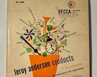 May include: A vintage record album cover featuring a colorful abstract design with musical instruments and a clock. The album is titled "Leroy Anderson Conducts" and features the text "Decca Extended Play 45 rpm Gold Label Series".