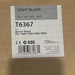 May include: A rectangular label for Epson Stylus Pro ink cartridge, labeled "LIGHT BLACK". The label includes the model number T6367, the ink volume of 700ml, and the text "MADE IN INDONESIA".