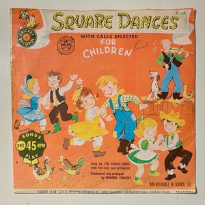 May include: A vintage record album cover featuring a colorful illustration of children square dancing. The album title is "Square Dances with Calls Selected for Children" and features a bonus 45 RPM record.