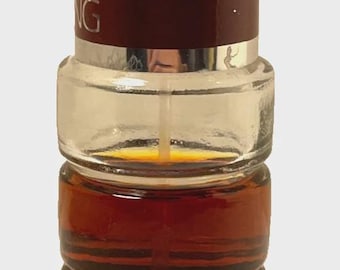 D. Vintage Bottle Of Flori Roberts Touching Cologne Splash