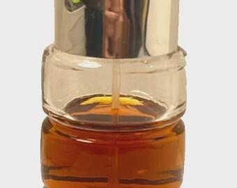 E. Vintage Bottle Of Flori Roberts Touching Cologne Splash