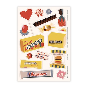 May include: A sticker sheet featuring various candy-themed designs. The stickers include a heart-shaped lollipop, a chocolate bar, and boxes of candy labeled "DOBS" and "Milk Buds." Other stickers depict a "Gummy Candy" burger and a "Wacky Taffy" bar.