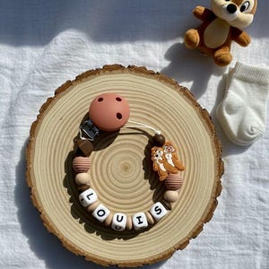 Tic and Tac pacifier clip