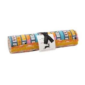 May include: Rolled fabric bundle with a Halloween design in orange, blue, and yellow. The fabric is tied with a black ribbon and a tag with a rabbit logo and the text "RUBY STAR SOCIETY".
