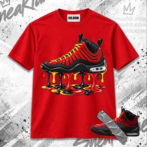 May include: A bright red short-sleeve t-shirt featuring a graphic of a black, red, and yellow sneaker with a melting effect at the sole. The design shows liquid drips in red, yellow, and black colors. The shirt has a Gildan brand neck label.