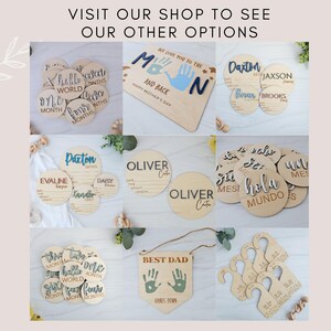 May include: A collection of wooden milestone markers, plaques, and nursery signs featuring laser-cut text and handprint designs. The items include circular discs with months, name plaques, and hanging signs with phrases like Hello World, Best Dad, and We Love You To The Moon And Back.