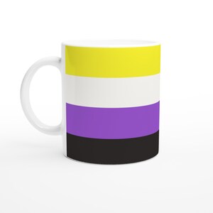 May include: A white ceramic mug featuring a horizontal four-stripe pattern. The stripes are arranged from top to bottom in yellow, white, purple, and black. The mug includes a curved handle on the left side and a cylindrical body shape.