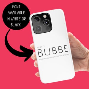 May include: White iPhone case with a black camera lens and the text "EST 2023 BUBBE YOUR NAME YOUR NAME YOUR NAME" printed on the back.