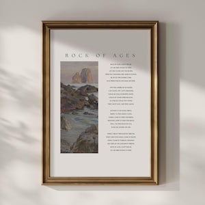 May include: A framed print with a gold-colored frame. The print features a landscape painting of rocks and water, with the words "ROCK OF AGES" at the top and a poem below. The artwork has a vintage aesthetic.