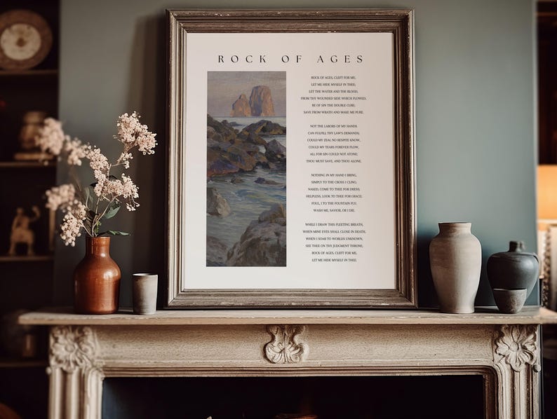 May include: A framed print with the text "ROCK OF AGES" and a poem. The artwork depicts a coastal scene with rocks and water. A brown vase with flowers and two ceramic vases sit on a mantel.