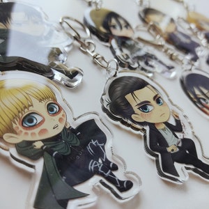 Titan Double Sided Charms/Keychains