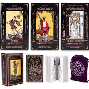 May include: A tarot card deck with black and gold designs. The deck includes cards with illustrations and text, a guidebook, and a purple velvet bag with a white pentagram design. The cards feature images of The Fool, The Magician, and The High Priestess.