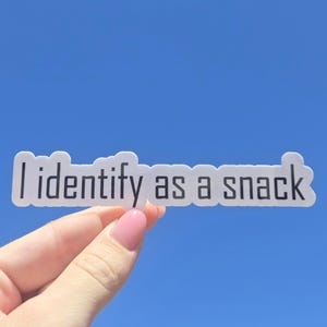Custom I identify as a snack sticker; Water resistant, perfects for cars, laptops and water bottles