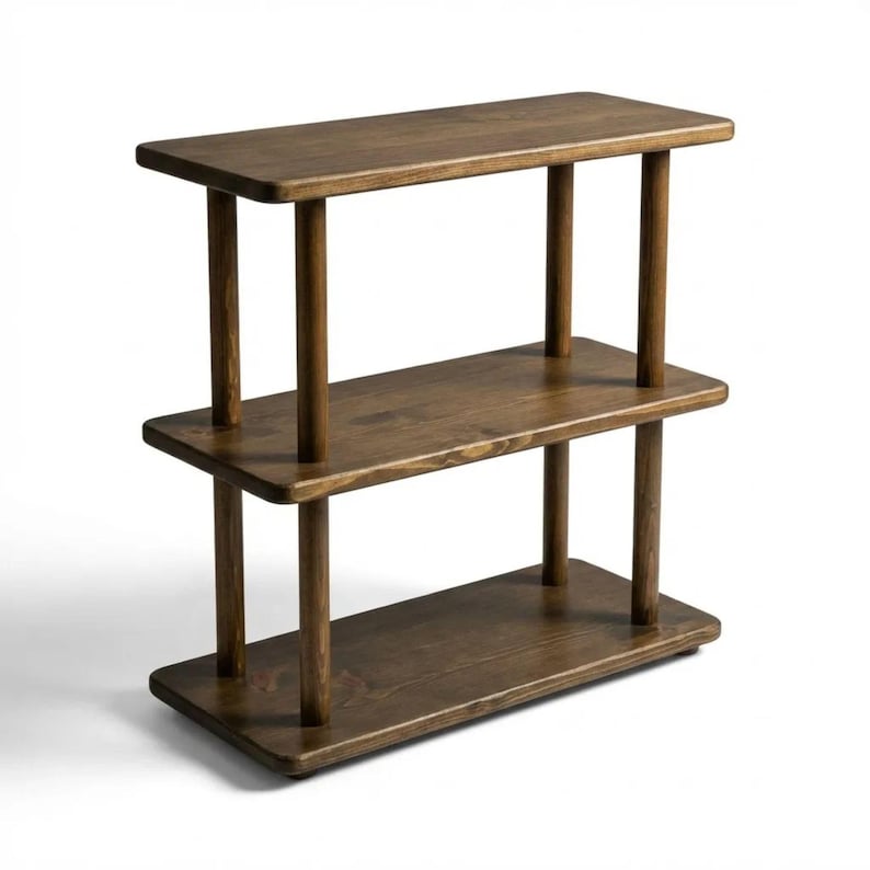 🪵 Narrow Solid Wood 3 Tier End Side Table

Space Saving Slim Book Organizer | Small Spaces Coffee Table for Sofa

Designed for compact living areas, this narrow solid wood 3 tier end side table is the perfect combination of style and functionality.

Its slim profile makes it ideal for placing next to a sofa, couch, or bed, while the three-tier design provides practical storage for books, décor, and everyday essentials.

A beautiful solution for small spaces without compromising on elegance ✨