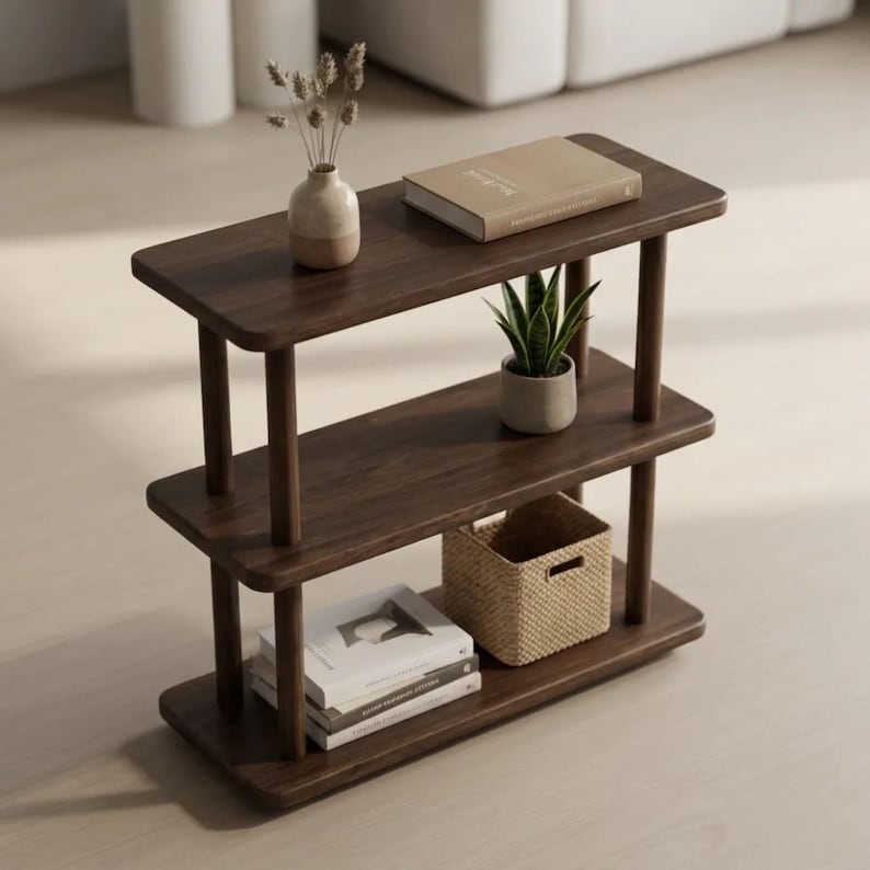 🪵 Narrow Solid Wood 3 Tier End Side Table

Space Saving Slim Book Organizer | Small Spaces Coffee Table for Sofa

Designed for compact living areas, this narrow solid wood 3 tier end side table is the perfect combination of style and functionality.

Its slim profile makes it ideal for placing next to a sofa, couch, or bed, while the three-tier design provides practical storage for books, décor, and everyday essentials.

A beautiful solution for small spaces without compromising on elegance ✨