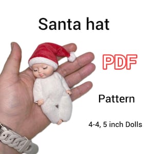 May include: A PDF pattern for a Santa hat for 4-4, 5 inch dolls. The pattern is shown on a white background with the doll wearing the hat.