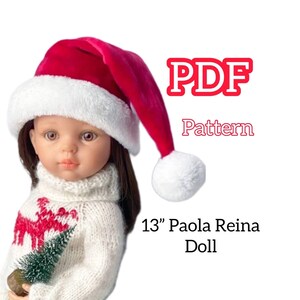 May include: PDF pattern for a red and white Santa hat for a 13 inch Paola Reina doll.