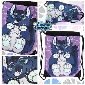 May include: A purple drawstring bag with a blue and white furry creature with a galaxy print. The creature has large eyes and a small nose. The bag has a black drawstring and a white star pattern.